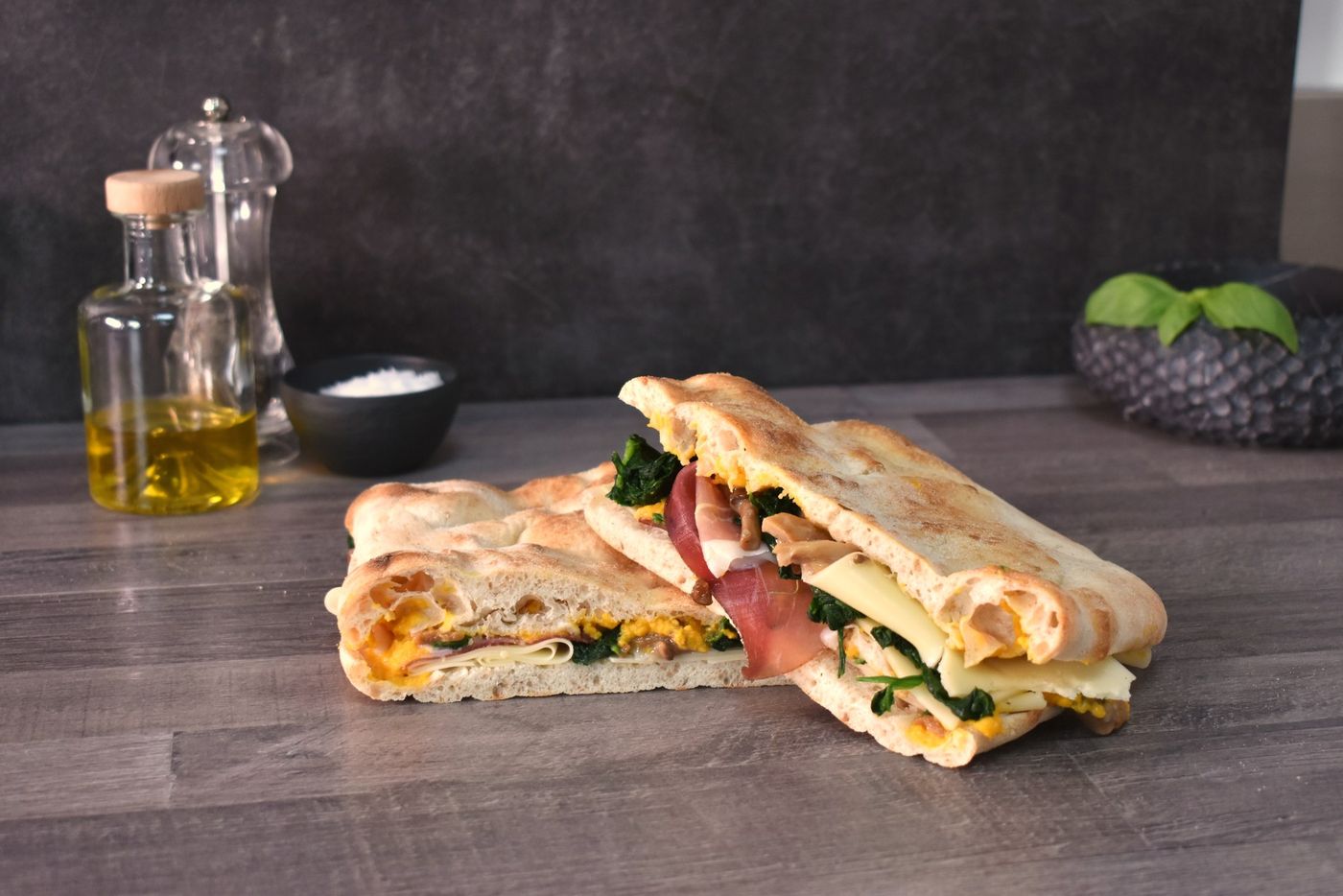 Topped with prosciutto crudo and artichokes