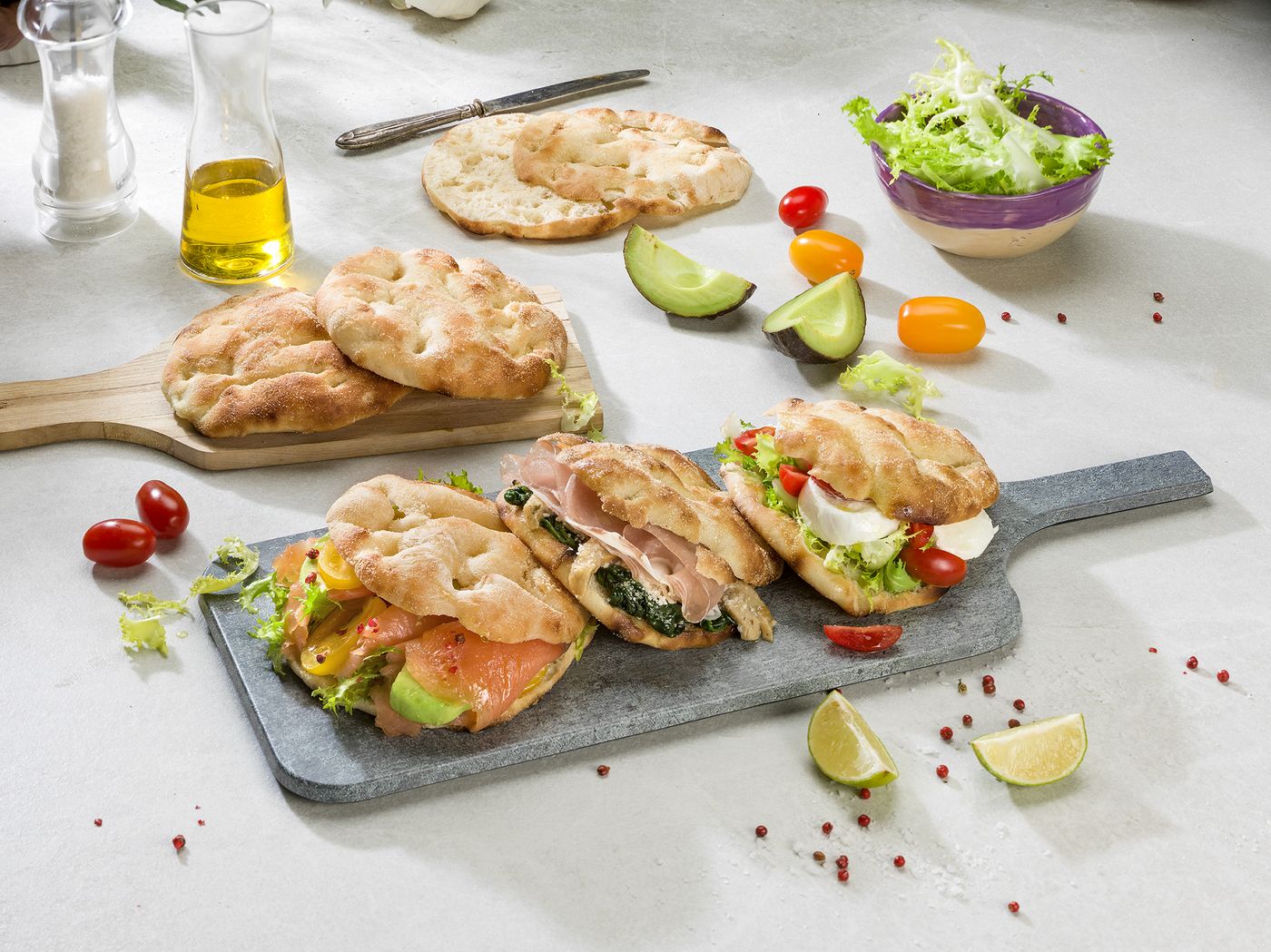 Focaccine filled with prosciutto, spinach, salmon and mozzarella
